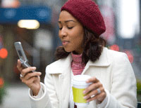 photo: woman using cell phone
