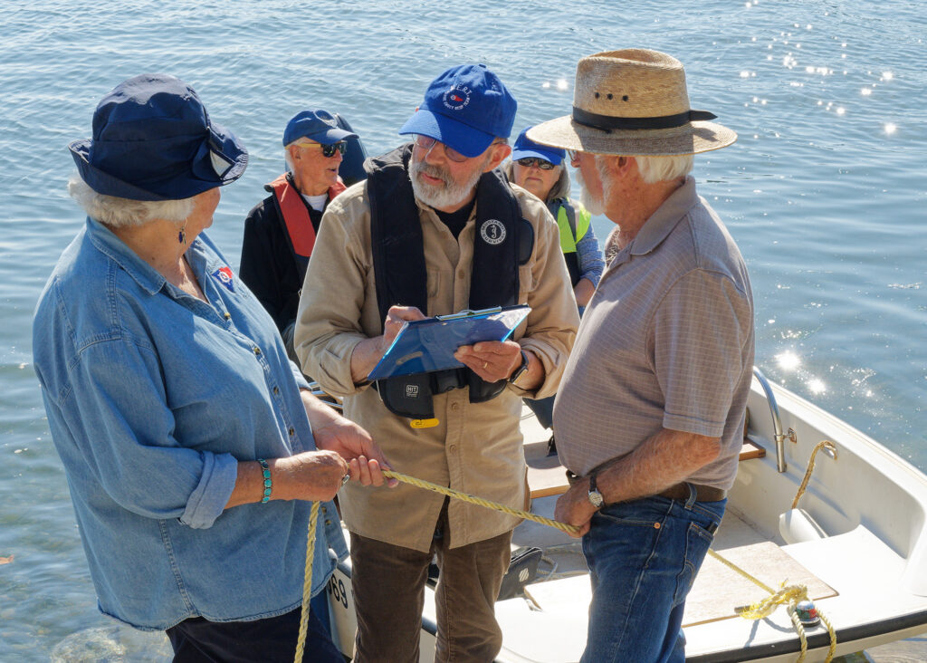 People in a boat as part of an exercise for Vashon Marine Emergency Response Team. Photo by Rick Wallace